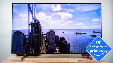 LG B6 OLED TV displaying skyscraper buildings