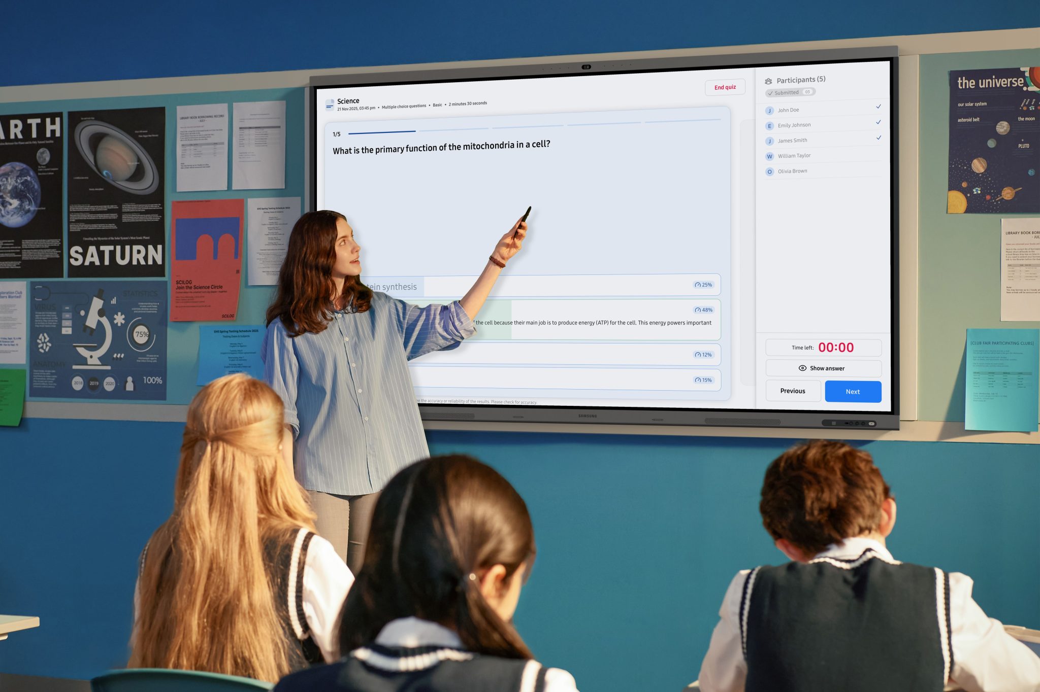 Women teachers use Samsung display technology to enhance the learning classroom.