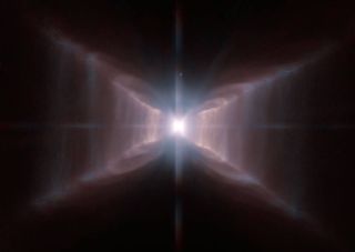 A Red Rectangle, also known as a proto-planetary nebula, surrounds the star HD 44179. This Hubble image captures an extraordinary view this unique cosmic structure and its apparent X-shaped structure, in addition to the glowing gas surrounding the star. T