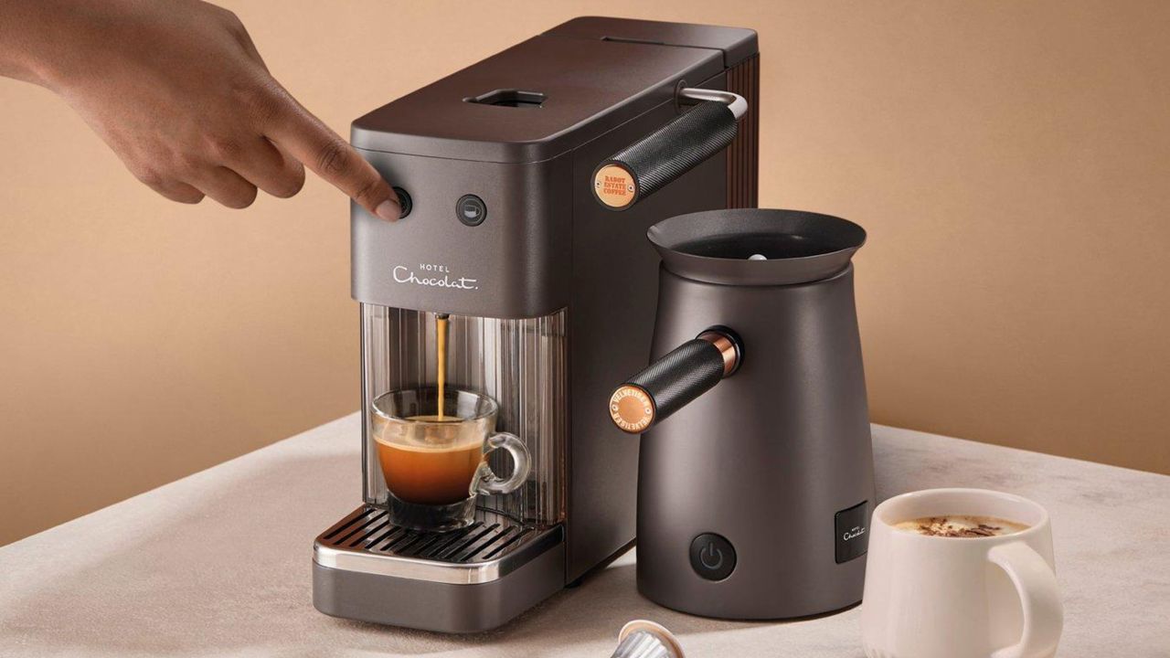 Hotel Chocolat Podster coffee machine creating a coffee