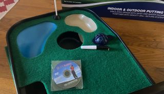 Various products of the PGA Tour Indoor & Outdoor Golf Putting Mat