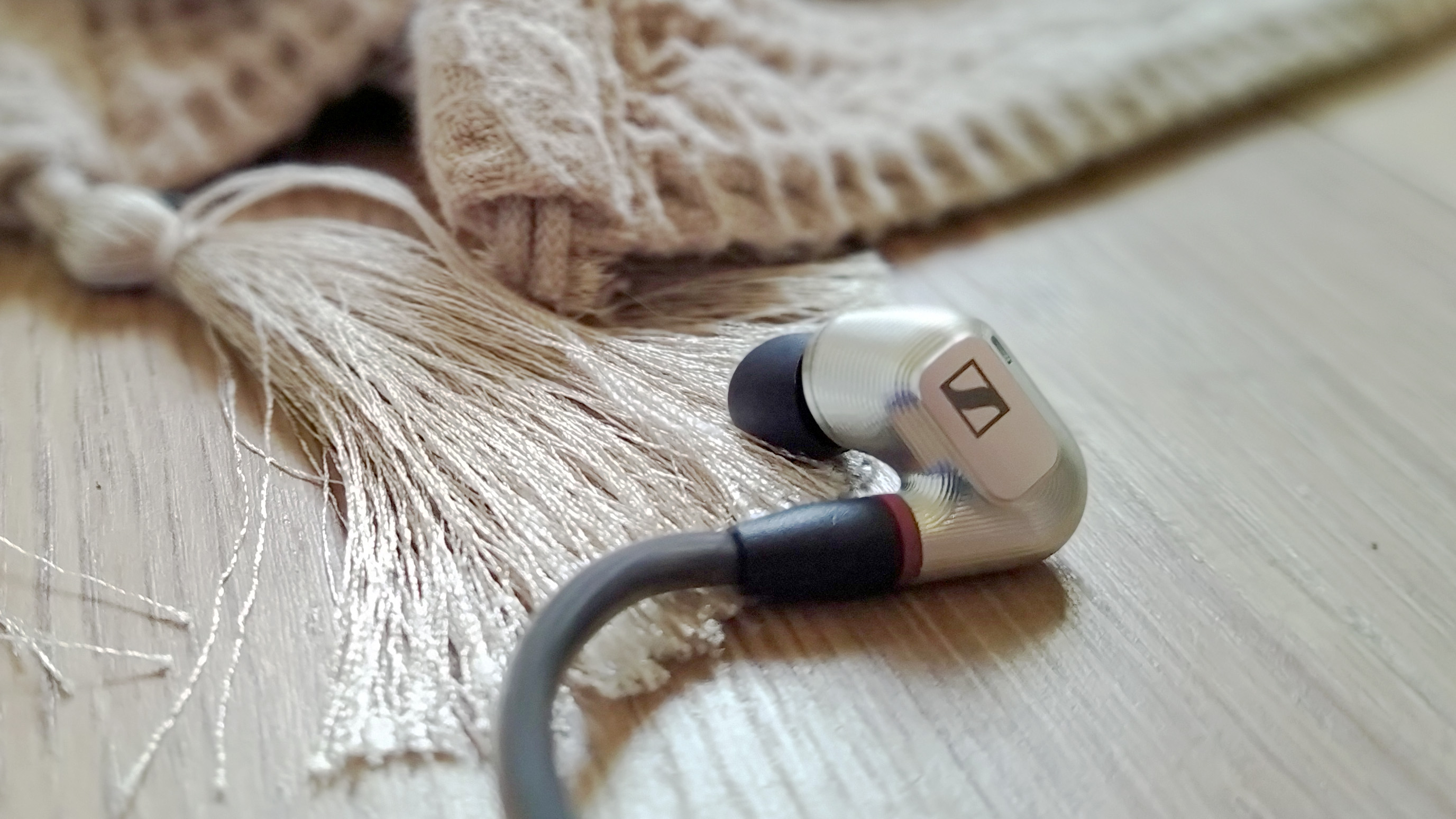 a closeup of the sennheiser ie 900 earbuds