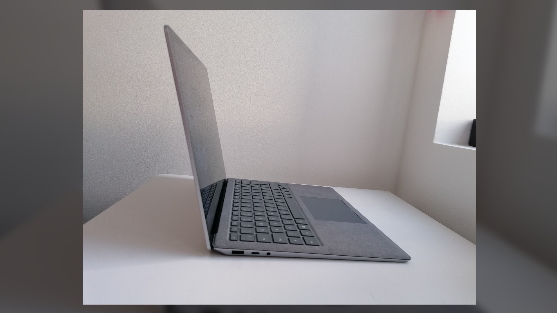 Microsoft Surface Laptop 4_left side view open_Mina Frost