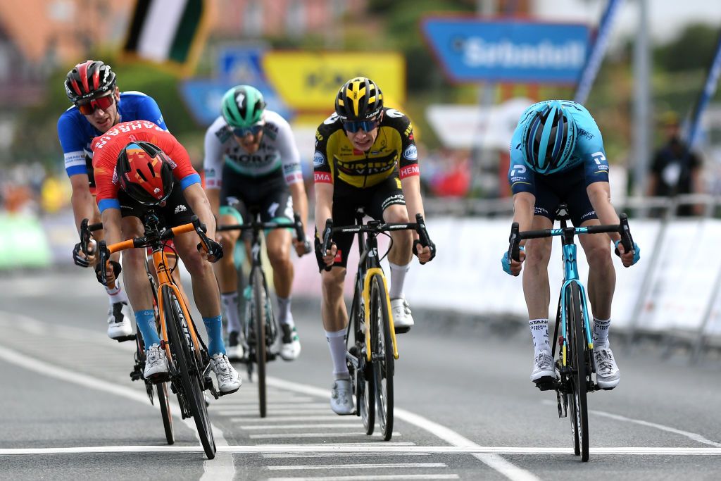 HONDARRIBIA SPAIN APRIL 08 Sprint Arrival Ion Izagirre Insausti of Spain and Team Astana Premier Tech Pello Bilbao Lpez De Armentia of Spain and Team Bahrain Victorious Jonas Vingegaard Rasmussen of Denmark and Team Jumbo Visma Brandon Mcnulty of United States and UAE Team Emirates Blue best young jersey during the 60th ItzuliaVuelta Ciclista Pais Vasco 2021 Stage 4 a 1892km stage from VitoriaGasteiz to Hondarribia itzulia ehitzulia on April 08 2021 in Hondarribia Spain Photo by David RamosGetty Images