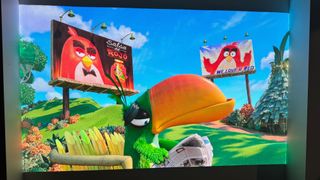 Scene from Angry Birds 2 movie projected onto a wall by the Xgimi Aura 2 projector