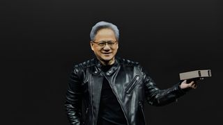 A photo of Nvidia CEO Jensen Huang, holding a DGX Spark