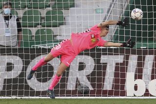 Elche keeper Edgar Badia had worked hard to keep Barcelona at bay before being beaten a second time