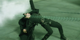 Neo (Keanu Reeves) does a backbend in a scene from The Matrix