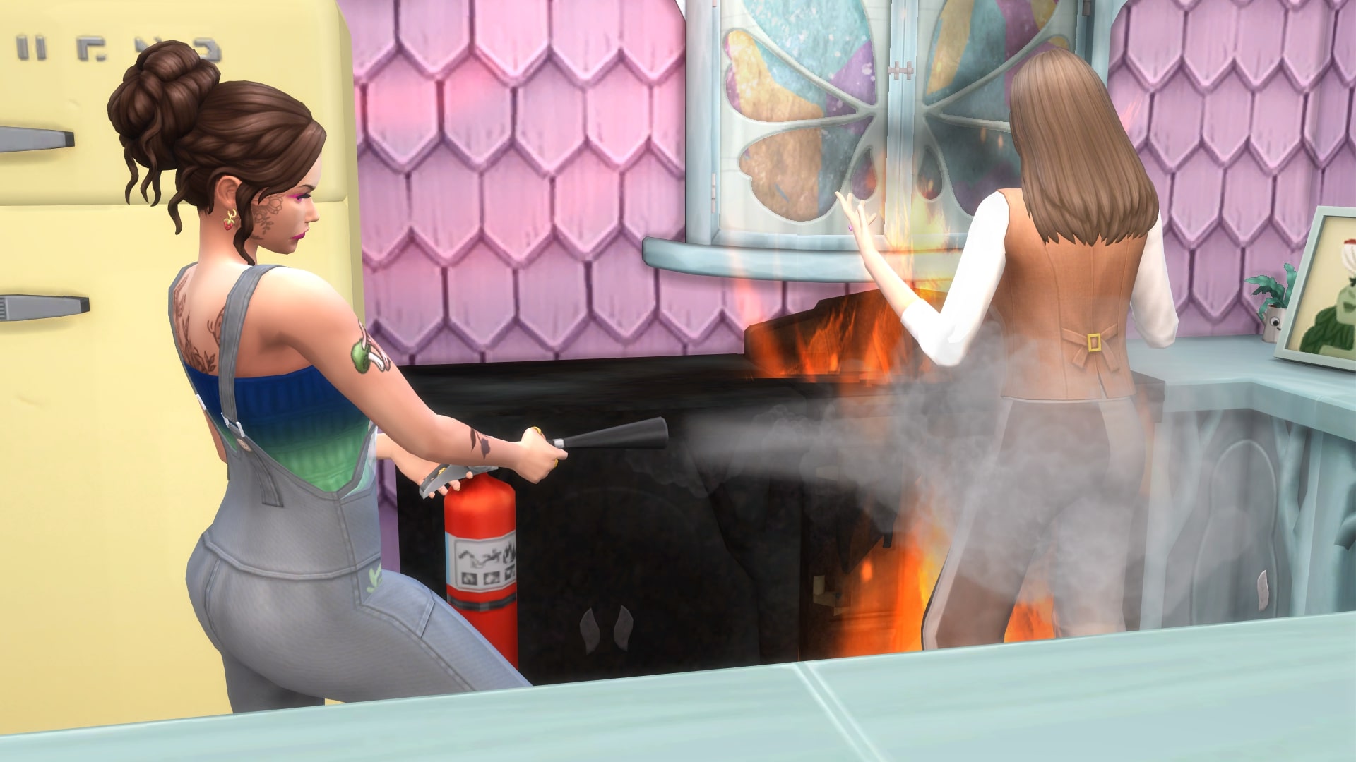 The Sims 4 Enchanted by Nature screenshot of one Sim extinguishing a fire in a kitchen that has engulfed the furniture and a fellow Sim
