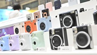 A photo from the 2024 CP+ show in Japan shows an Instax camera display