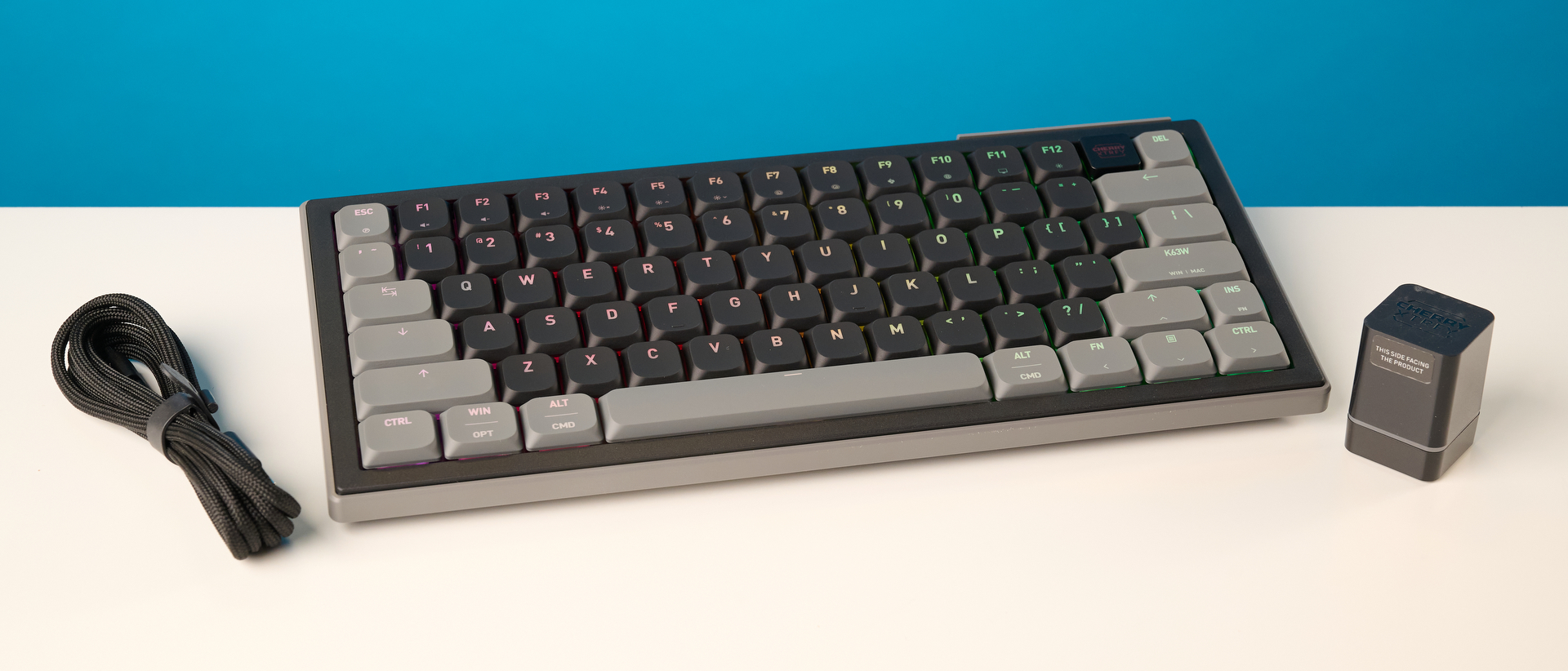 A black Cherry XTRFY K63W Pro Compact mechanical gaming keyboard