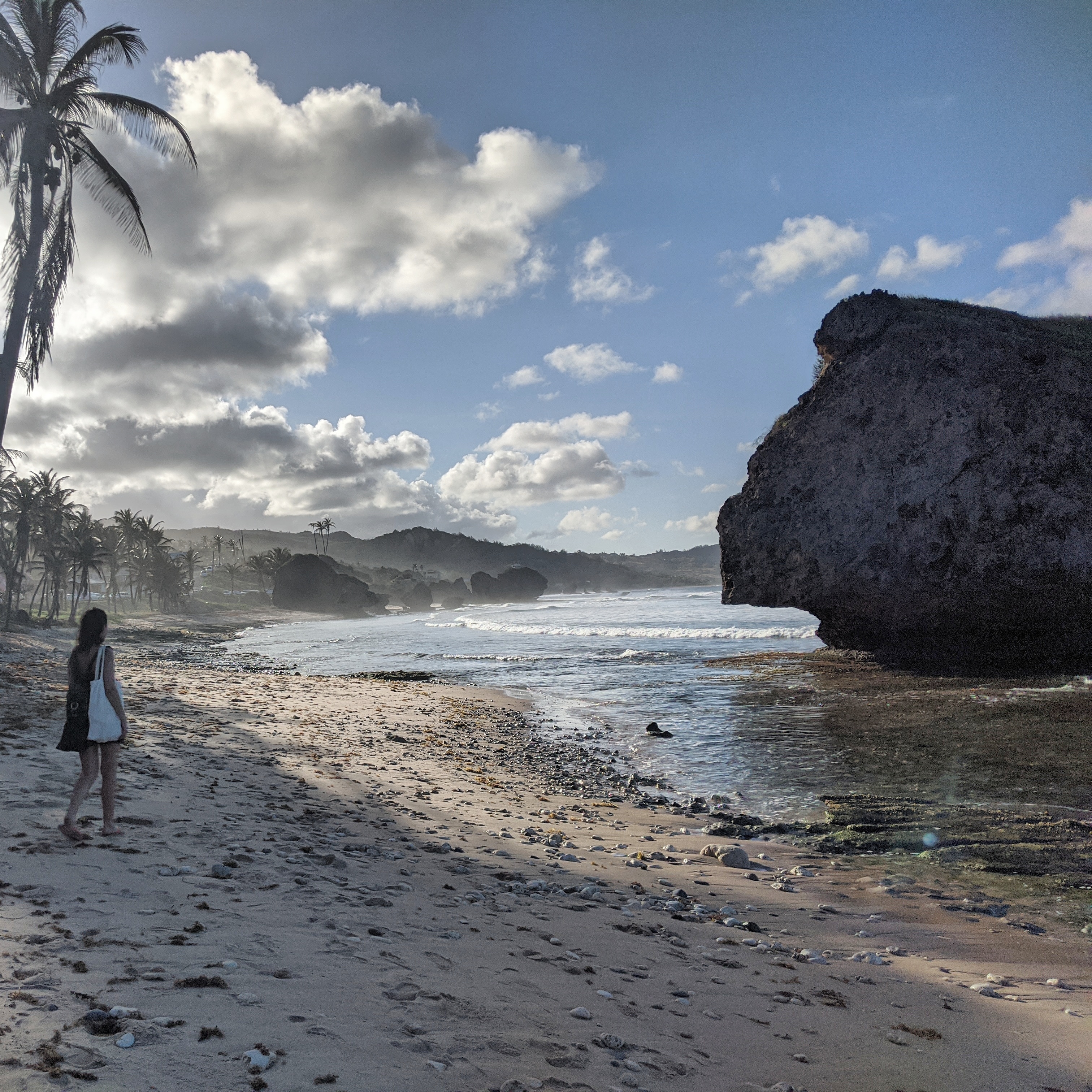 Lydia Swinscoe walks along Bathsheba Beach, Barbados, one of the world's most beautiful beaches