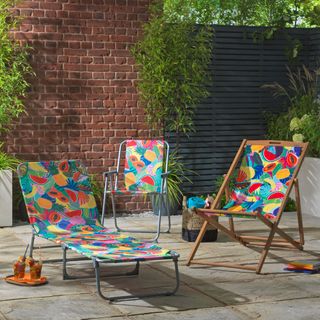 patio area with colourful lounge chairs