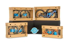 Several bikes packed safely in BikeFlights boxes with cross sections showing how they look inside the shipping containers