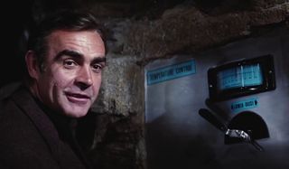 Diamonds Are Forever Sean Connery stands next to a very fatal switch