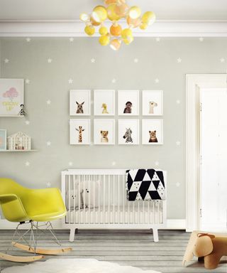 Gender neutral nursery ideas: Grey and yellow scheme with white cot by DelightFULL