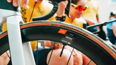 Continental Grand Prix TR is seen on a wheel rim close up