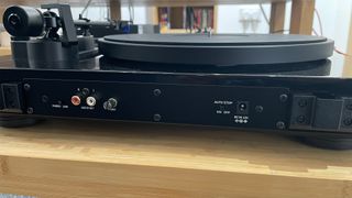 Dual CS 618Q turntable pictured from back showing connections