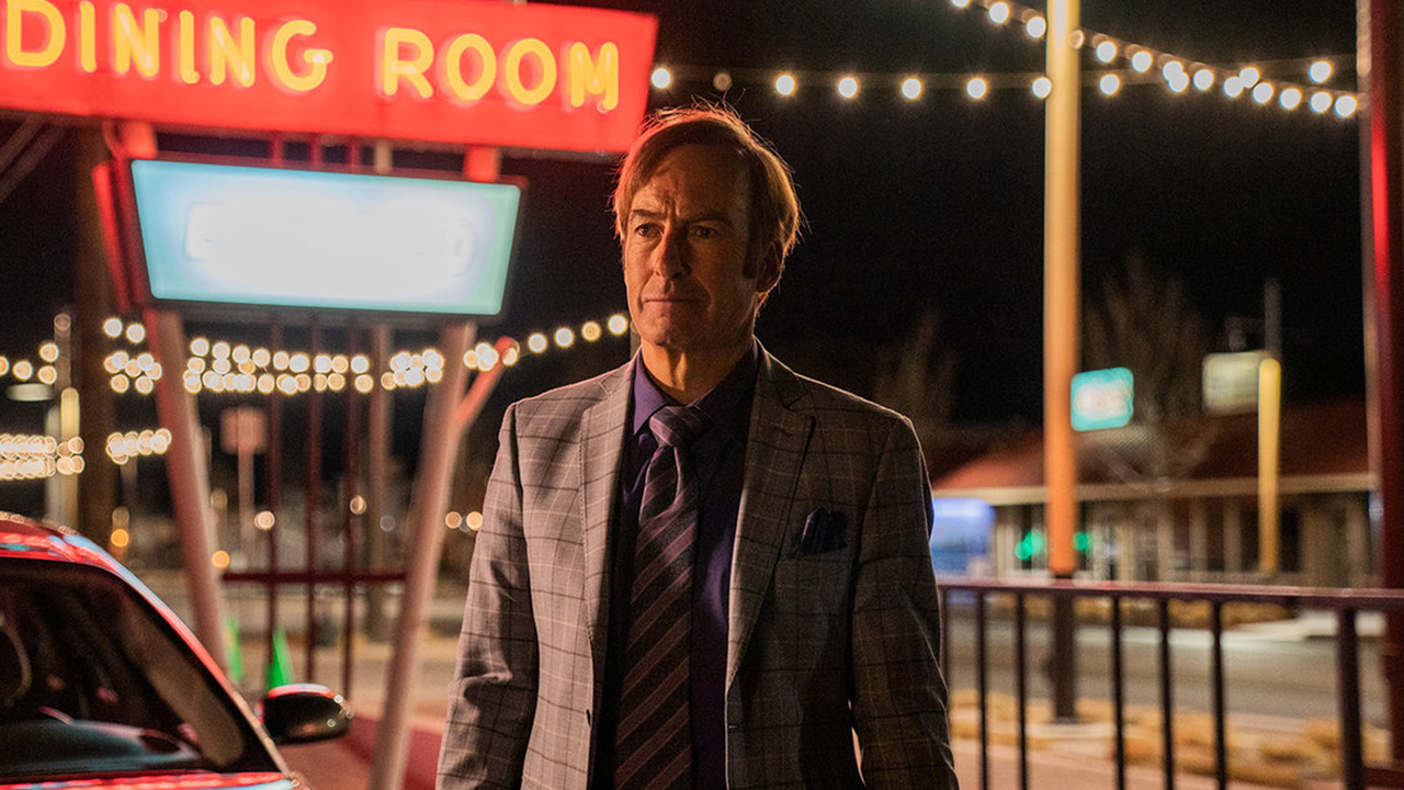 Bob Odenkirk's Sau Goodman stands in a parking lot alone at night in Better Call Saul season 6