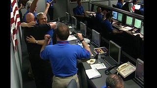 Phoenix team members celebrate the Phoenix landing on Mars, May 25, 2008.