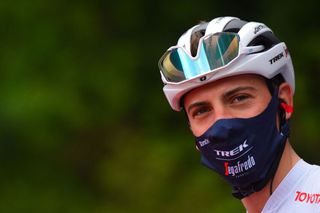 Team TrekSegafredo rider Italys Giulio Ciccone stands on the presentation podium prior to the start of the sixth stage of the Giro dItalia 2021 cycling race 160 km between Grotte di Frasassi and Ascoli Piceno San Giacomo on May 13 2021 Photo by Dario BELINGHERI AFP Photo by DARIO BELINGHERIAFP via Getty Images