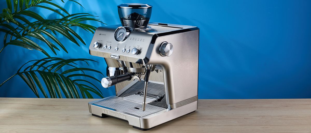 De&#039;Longhi La Specialista Opera is a stainless steel manual espresso machine with smart tamping, a group handle, steam wand, and grinder