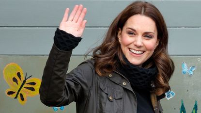 Kate Middleton wearing Barbour jacket waving