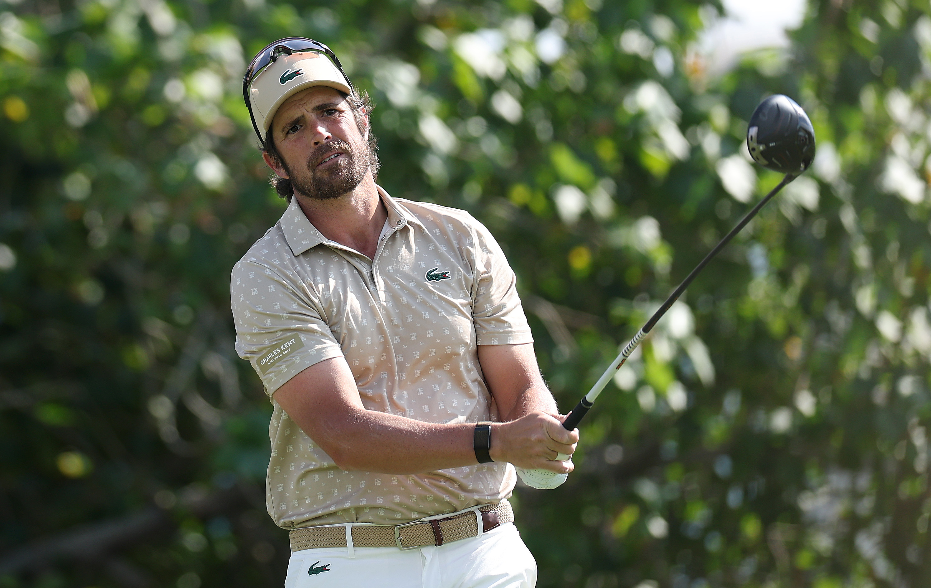 Nacho Elvira hits a tee shot with a driver