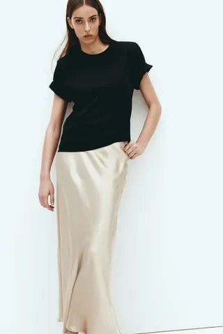 model wears Satin Maxi Skirt and black tee 