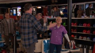 Leslie Knope (Amy Poehler) with jerk bowler in Parks and Recreation