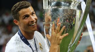 Cristiano Ronaldo celebrates with the Champions League trophy after Real Madrid's win over Atletico Madrid in the 2016 final in Milan.