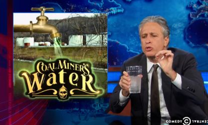 Jon Stewart drinks water
