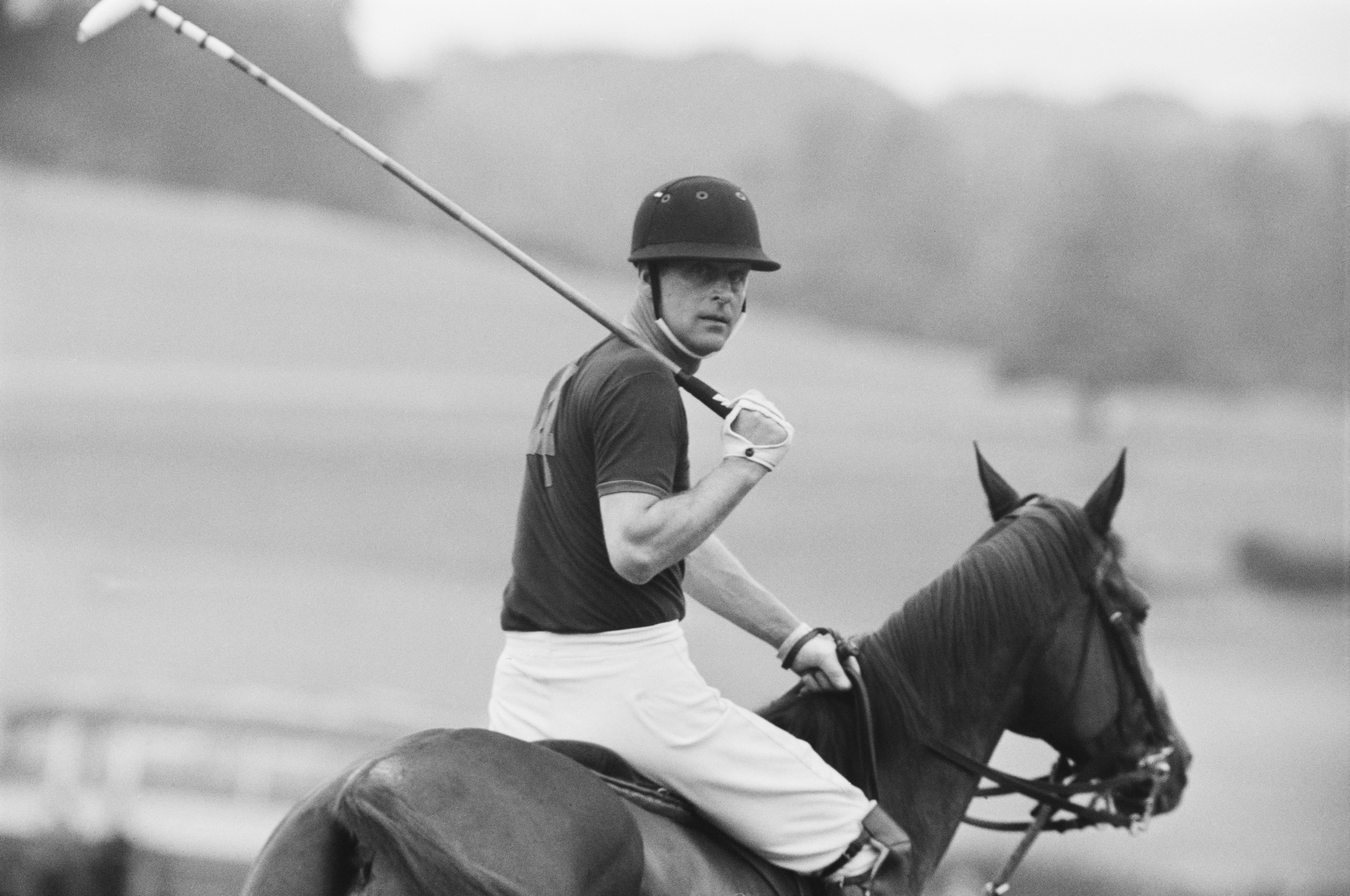 Prince Philip on horseback playing polo at Windsor Park in July 1967