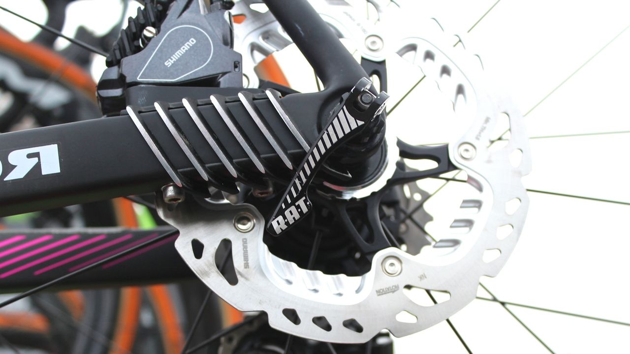 Merida is using the RAT system, which combines the speed of quick release with the stability of a thru axle