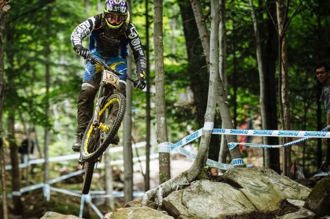 Sam Hill racing to a win at the Mont-Sainte-Anne World Cup