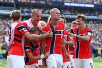 EAST RUTHERFORD, NEW JERSEY - JULY 05: Erling Haaland #9 of Norway celebrates with teammates after scoring his team's second goal during the FIFA World Cup 2026 Round of 16 match between Brazil and Norway at New York New Jersey Stadium on July 05, 2026 in East Rutherford, New Jersey. (Photo by Al Bello/Getty Images)