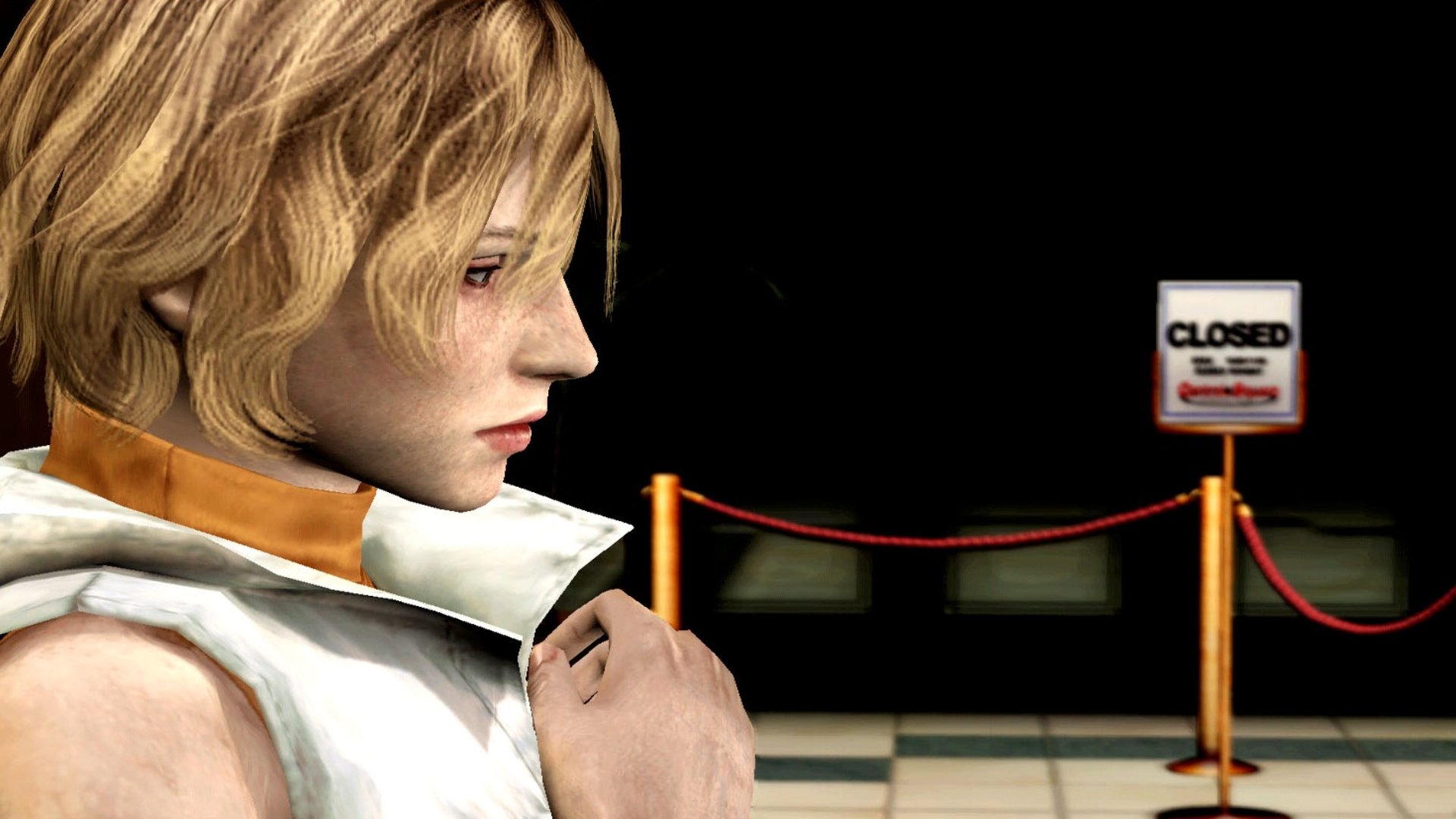 Silent Hill 3 screenshot of Heather standing with her hand clutched to her chest before a red railing rope with a closed sign nearby