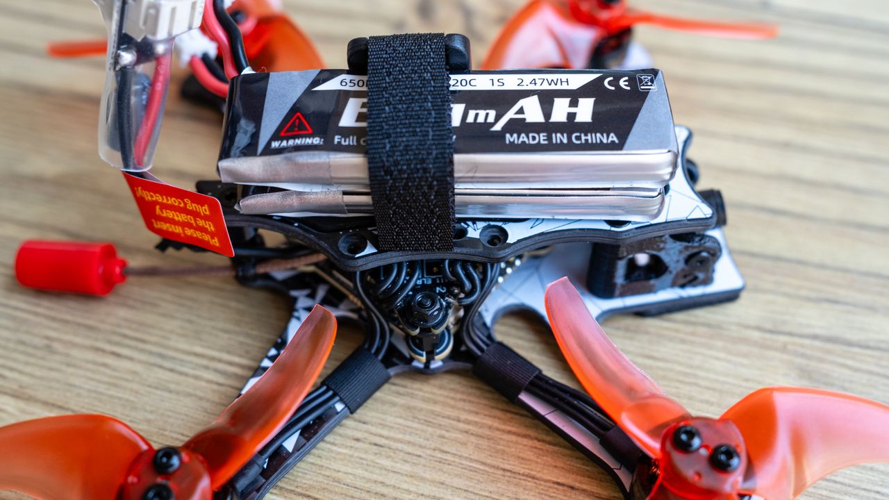 Emax Tinyhawk III Pro Freestyle RTF Kit Emax Tinyhawk III Pro Freestyle RTF Kit drone with batteries attached side view