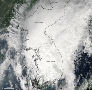 Tropical Storm Tembin blankets the entire Korean peninsula in this true-color image taken on Aug. 30, 2012, by the MODIS instrument on the Aqua satellite.
