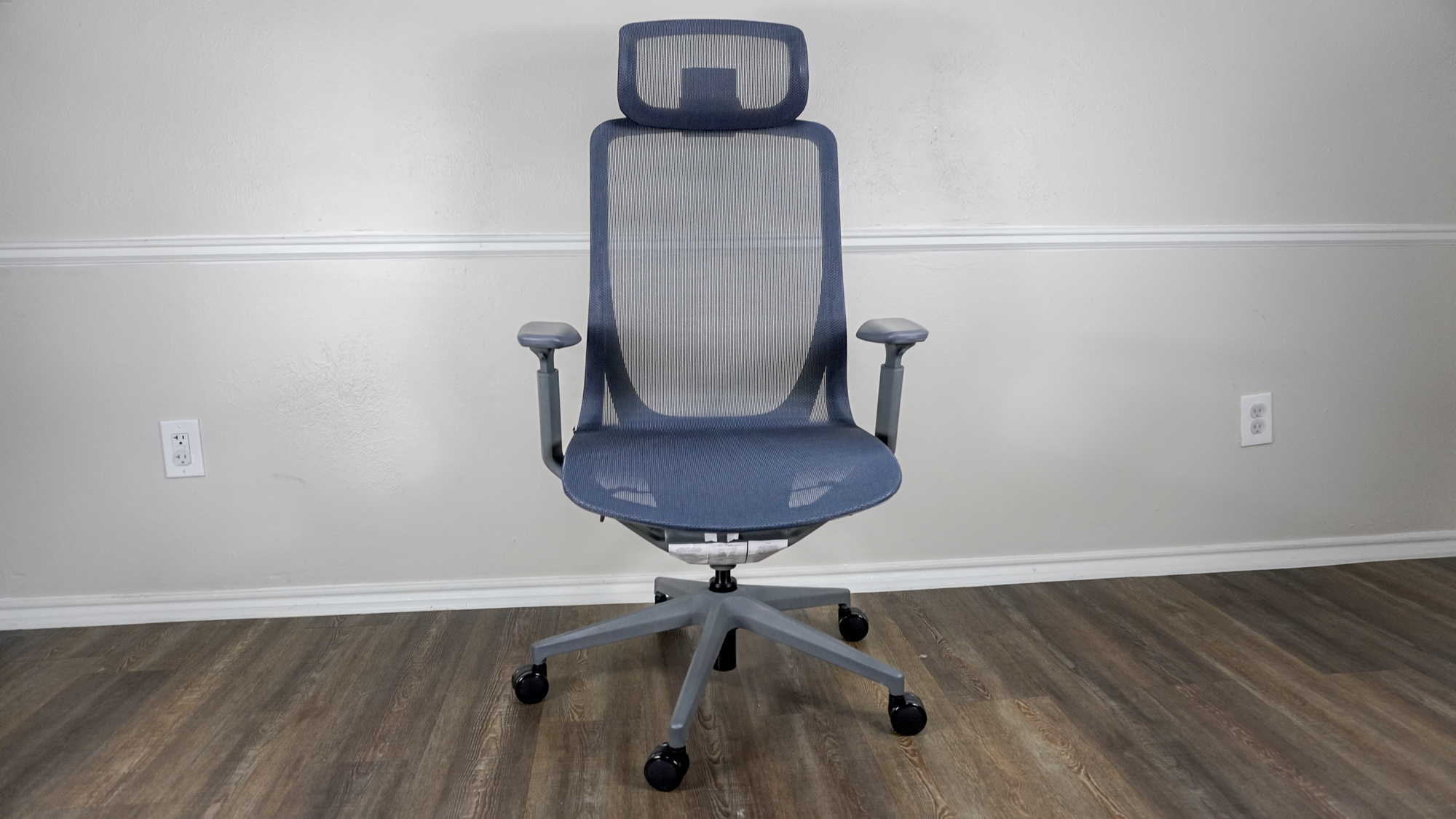 The Branch Aire Chair fully assembled up against a wall