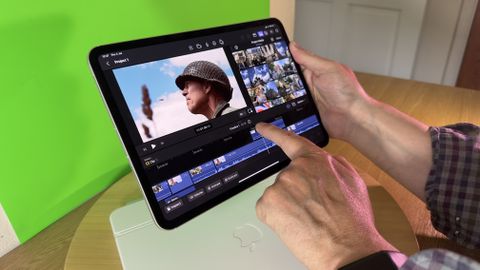 iPad Pro 11-inch (M4) tablet held in a hand