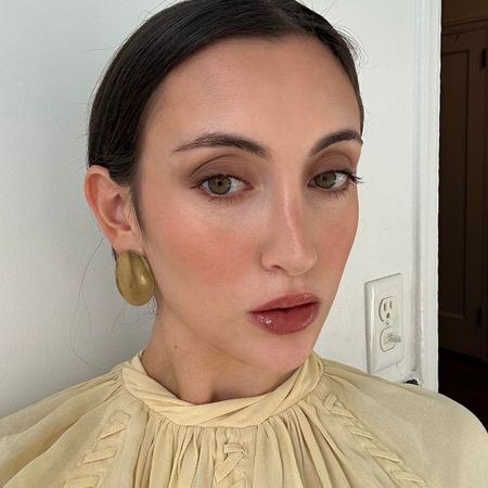 Photos of Alyssa Brascia wearing and holding brown mascara.