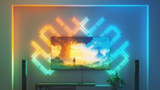 A TV in a living room surrounded by bright Nanoleaf light panels