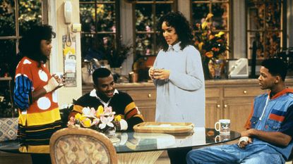 The Fresh Prince of Bel-Air family sitting around the kitchen table