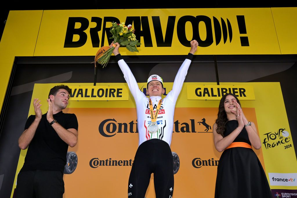 VALLOIRE FRANCE JULY 02 Tadej Pogacar of Slovenia and UAE Team Emirates celebrates at podium as stage winner during the 111th Tour de France 2024 Stage 4 a 1394km stage from Pinerolo to Valloire UCIWT on July 02 2024 in Valloire France Photo by Tim de WaeleGetty Images