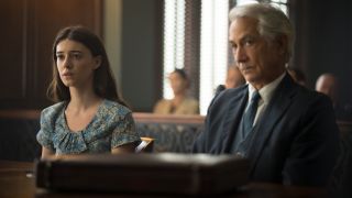 Daisy Edgar Jones and David Strathairn sit patiently in the courtroom in Where The Crawdads Sing.