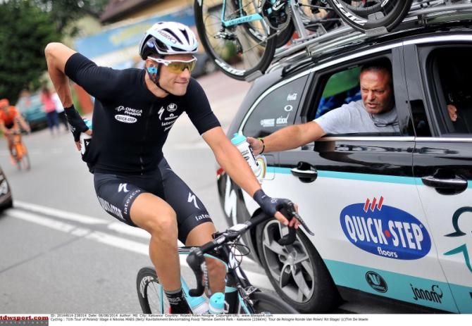 Nikolas Maes (Omega Pharma - Quick-Step) drops back to the team car