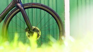 Industry Nine SOLixfront wheel against a green background