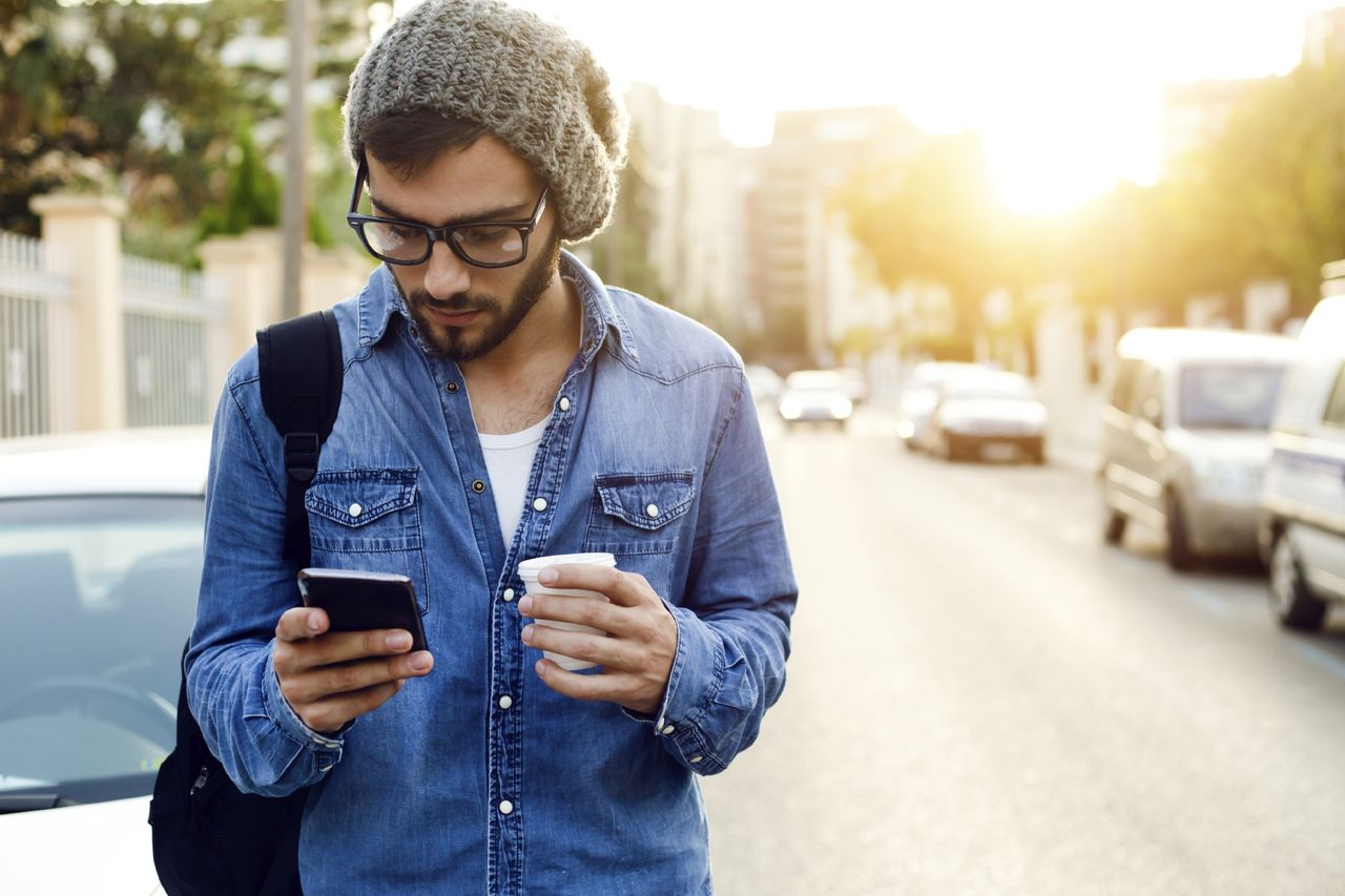 A man using his smartphone