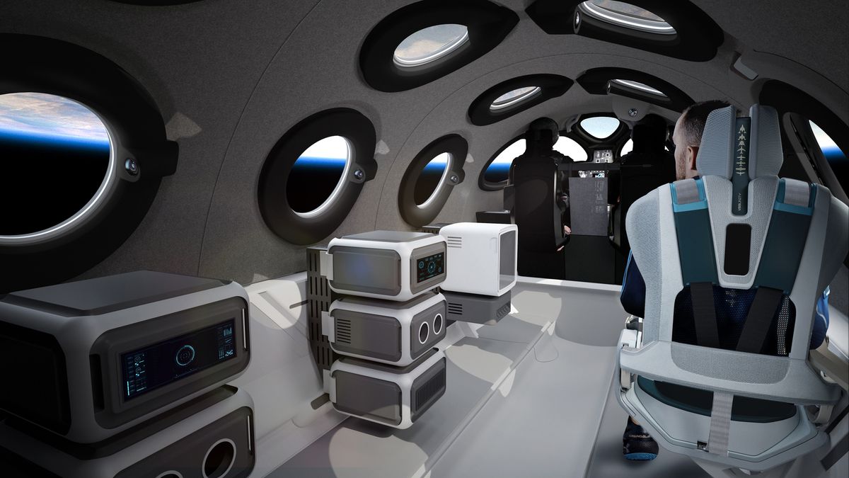 This view of the SpaceShpTwo cabin shows a configuration for science payloads, which take the place of some seats.
